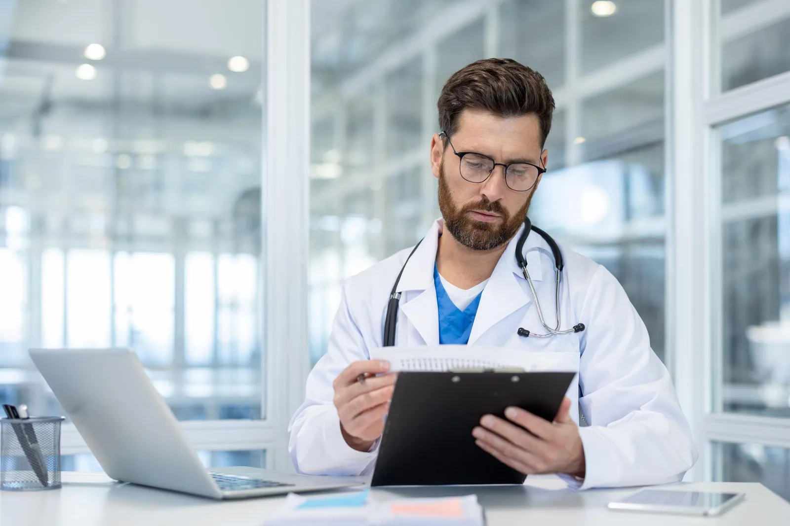 Healthcare professional reviewing clinical information
