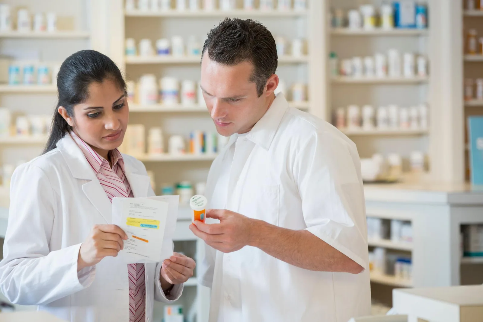 Pharmacist reviewing medication labeling information